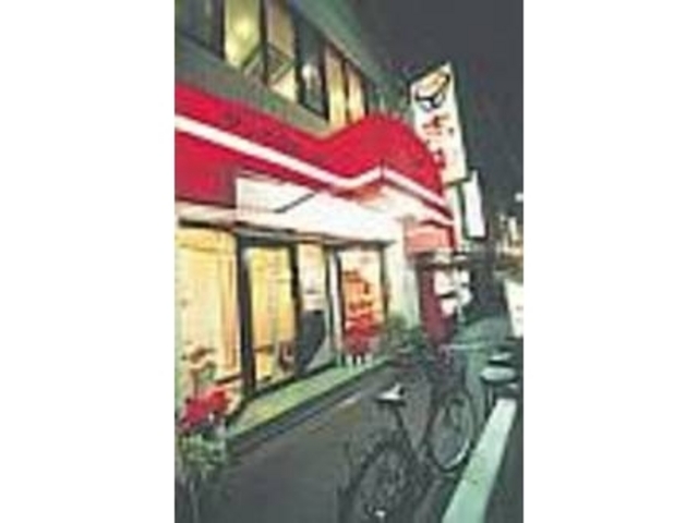 1階は炭火で頂けるテーブル席。2階は座敷_吉田 生野西店