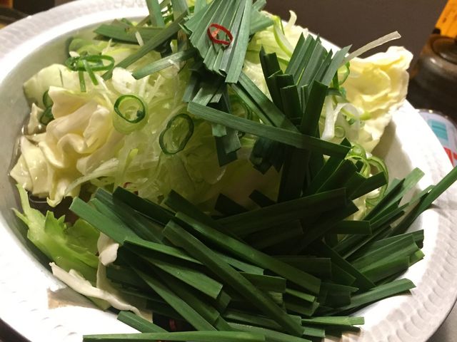 葱もつ鍋。もつは小腸じゃないかな?プリプリで油がでてる。_旬彩酒庵 おねぎや 袋町店