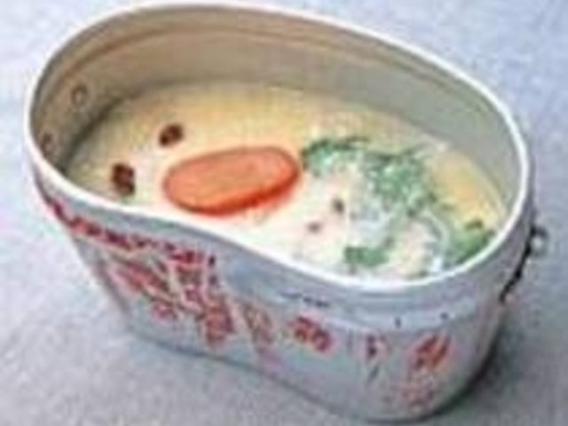 明太の辛みが優しいスープのアクセントに_はんごう雑炊の店 山