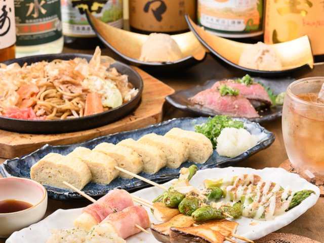 鉄板居酒屋まんぷくの写真1