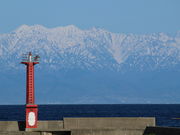 まいさんの海越しに望む立山連峰の投稿写真1