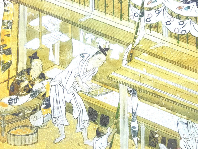 狩野吉信筆『職人尽図』型置き師、現在でも板の上に生地を貼り染めております。_京友禅型染め体験工房北本染芸