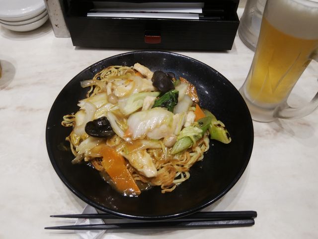 2021年10月限定の「カレーあんかけ焼そば」です。_餃子の王将 門前仲町店