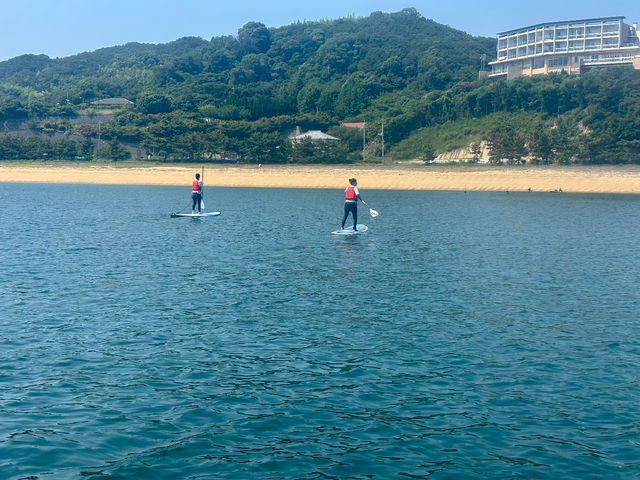 弓削島にある快水浴場百選に選定されたきれいな海と砂浜を眺めながらのSUP体験_UMITO-Island SUP Kamijima-