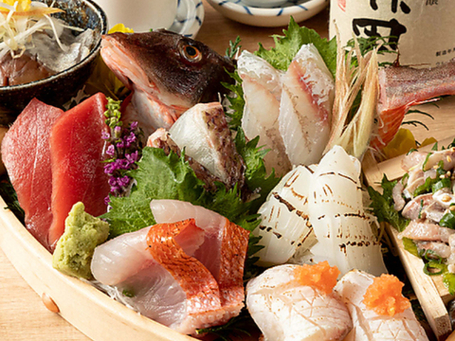 築地海鮮居酒屋 ISSEI酒場 草加店の写真1