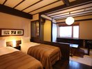 【フォレストビュークラシック(和洋室)/32u】窓からは大雪山国立公園の原生林がご覧いただける和洋室。