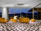 山に沈む夕日に染まるオーシャンビュー フロントロビー〜2024年12月リニューアル〜