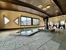 大浴場「銀河」※男女入れ替え制床面には伊豆の山々から切り出された「伊豆石」を使用しています。