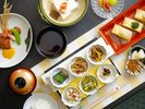 【朝食】おばんざいはおから、茄子揚げ煮、焚物など日替わりでご提供。