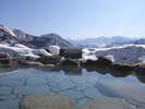 大浴場男性露天風呂（冬）雄大な谷川連峰の山々を眺めながら湯ったりとお寛ぎください。
