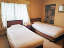 【406常盤】4階　湯ノ坂館　和洋室のベッドルーム。当館には、和洋室は2部屋ございます。