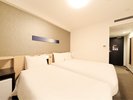 【3名利用時】コンパクトツインルーム(広さ18u/150cmのベット1台と85cmのエキストラベット1台)