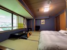 【倶楽部ルーム】和室ベッド36u/10畳 ローベッドが配置されゆったりとお休みいただけます