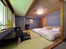 【倶楽部ルーム】和室ベッド36u/10畳 ローベッドが配置されゆったりとお休みいただけます