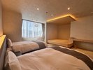 ■和洋室A/小上がりで寛ぎ、お休みの際はベッドで寛ぐ和モダン和洋室