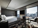 【プレミアム_デラックスツイン】足元に広がる高層階からの眺望をお楽しみください。