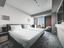 【スーペリア_ツイン】8階〜12階/眺望:北側。お二人でもゆったりと過ごせるミニマルルーム。