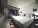 【スーペリア_+_ツイン】北海道開拓の象徴でもあるレンガ壁がアクセントのお部屋です。