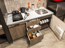 【客室一例】キッチンには冷蔵冷凍庫・電子レンジ、調理器具をご用意しております。