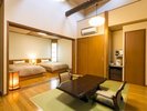 広々とした和洋室。寝室とリビングは扉で仕切ることができます