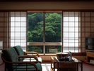 当館唯一のベッドタイプルーム。最上階からの眺望が楽しめる。
