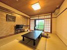 窓から緑が飛び込む南館10畳タイプ客室イメージ