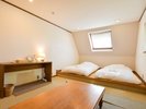 寝室B(1F) 小上がり+マットレス+布団が2床あります。
