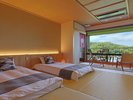 窓の向こうに広がる自然と、心地よい眠りへ誘うローベッド