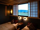 露天風呂&内風呂付き和洋室の寝室の一つ