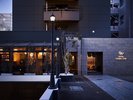 落ち着きのあるエントランスがお客様をお出迎え