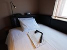 マッサージチェアの無いお部屋にはクッション型かマッサージガンをご用意しております。