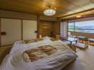 和室に籐のベッドを置いたお部屋です。