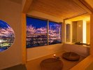 【和洋室/葵】からの景色。桜の季節には見事な桜並木が見渡せます。