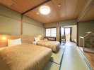 【和室ツインベッド】和の空間が広がる落ち着いた雰囲気となっております(一例)