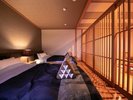 モダン風和洋室15畳 全室シモンズ社製マットレス(セミダブル)でごゆっくりお休みいただけます。