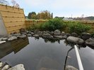 【露天風呂 男湯】野趣溢れる石造りの露天風呂。 こちらも湯量がすごい!