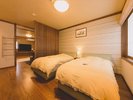 【森のデラックス218号室】ゆとりのあるベッドをご用意しています