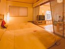 【だんぶり長者 207号室】ベッドルーム(小上がりにお布団をご用意)