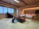 【和洋室・15畳】マッサージ機付和洋室。シーリー社製のベットマットで快眠を。