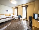 【デラックスツイン】ゆったり22平米のお部屋は、エキストラベッドを使えば最大3名様までご宿泊可能です