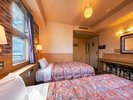 【別館スタンダードツイン】ベッドはシングルベッド×2の角部屋となります。