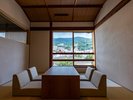 【琉球畳憩いの座付き二間和洋室/海風を感じる露天風呂付き】リビングルーム/A客室