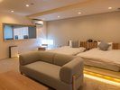 【サウナ付き角部屋和洋室/海風を感じる露天風呂付き】ベッド&リビングルーム/F客室
