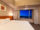 デラックスシングルルーム〈夜の景色・別府側〉