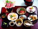 ・【夕食一例】季節の恵みを贅沢に盛り込んだ会席膳。上品な味わいで特別な夜を演出します