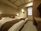 シングルベッドが2台独立したお部屋でプライベートな空間を演出。