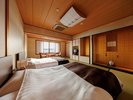 ■【花水木】本館和室10畳 ツインベッド/下諏訪の街並みを望む