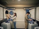 2階 ランドリーのご利用イメージ。上側の乾燥機の稼働時間はは10〜60分単位でお選びいただけます。