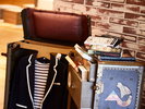 エレベーターホール|旅の記憶と物語が詰まったトランク。お気に入りの本とともに心安らぐホテルステイを。