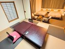 【和洋室一例】6畳の和室スペースとツインのベッドスペースがある和洋室タイプのお部屋です。